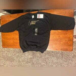 Nike sweatshirt brand new with tags black/gold youth large
